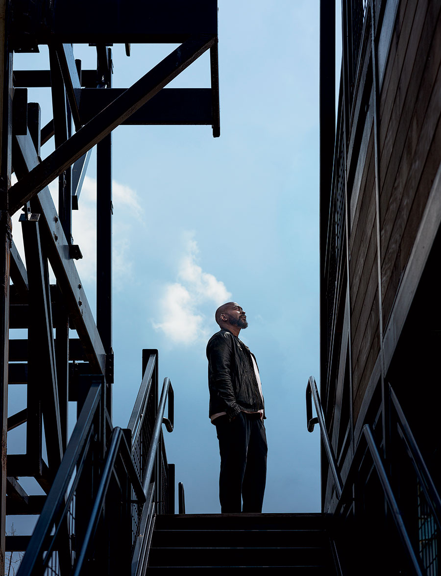 Eric Williams standing at the top of a staircase at The Salt Shed